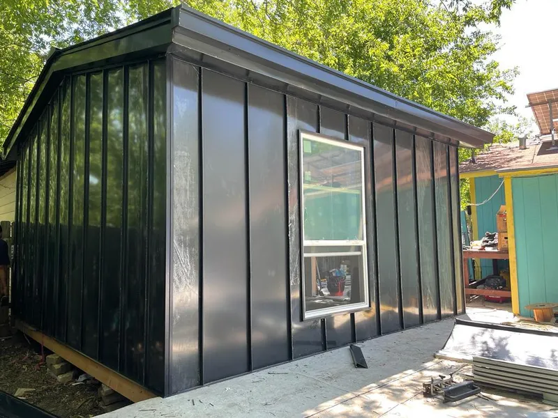 Black standing seam metal wall panels for Metal Roof Installation in Ironton