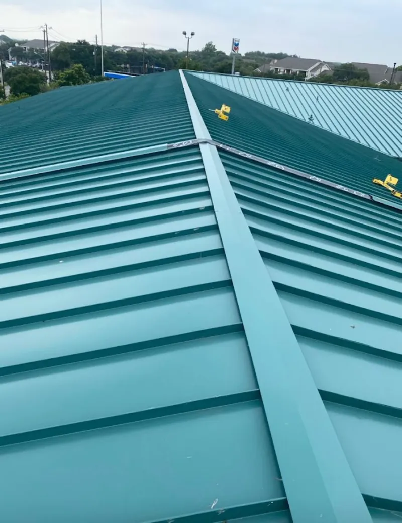 Green commercial metal roof ridge and valley for Metal Roof Repair in Ironton